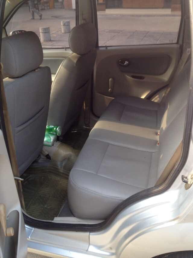 一手私家车,哈飞路宝07年上户手续齐全,冷暖空调 电动车窗 真皮座椅高清图片
