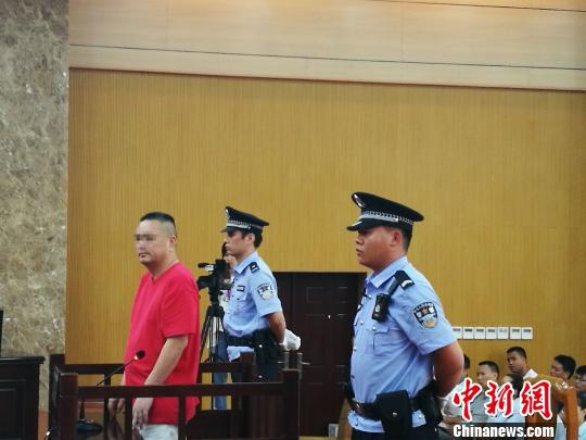 图为庭审现场。 韦成 摄